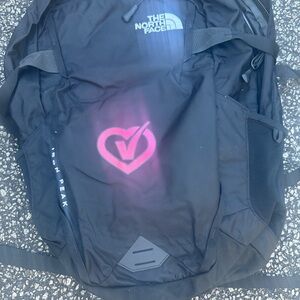 The North Face Black Backpack with Pink Check Heart